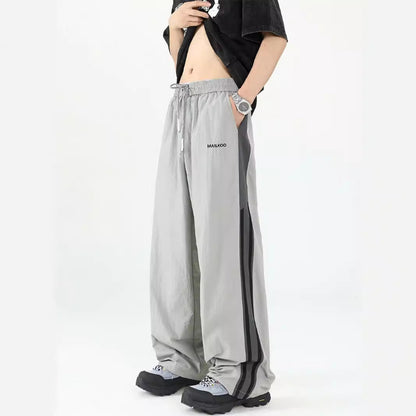 サイドライン ワイドナイロンパンツ ライトグレー 横ストライプデザイン High land